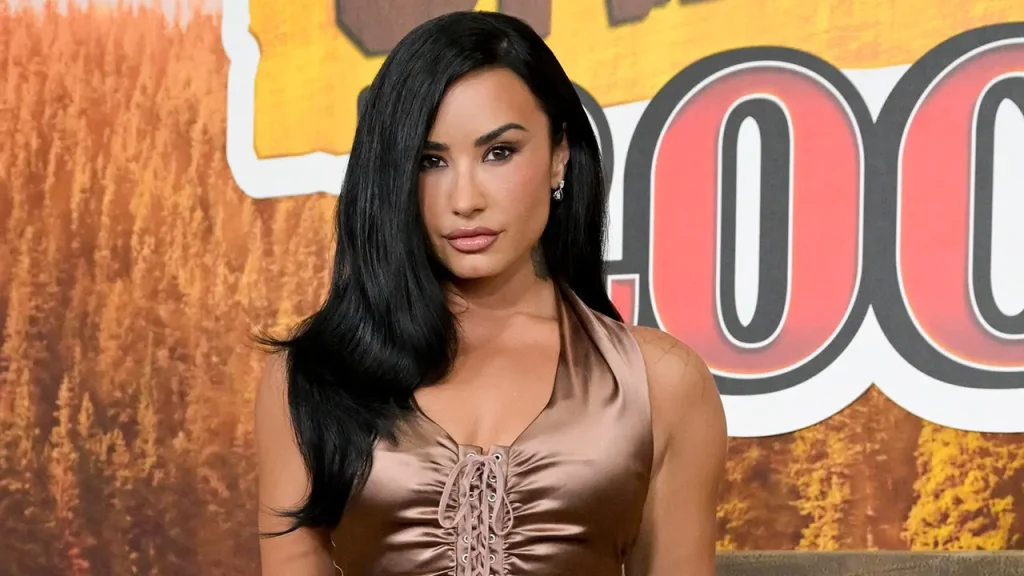 Demi Lovato celebrates her birthday in the Bahamas by riding a jet ski in a bikini.