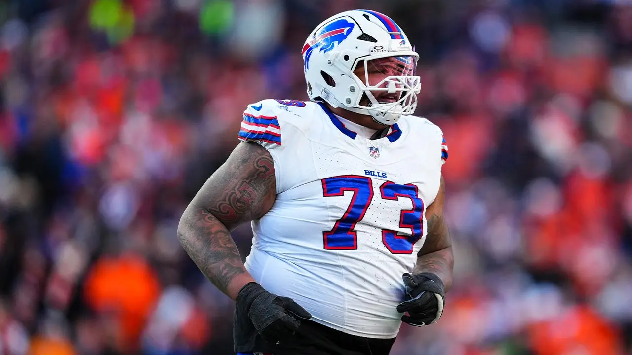 Dion Dawkins of the Bills ignites a heated discussion after cleaning up his dog's waste on the practice field