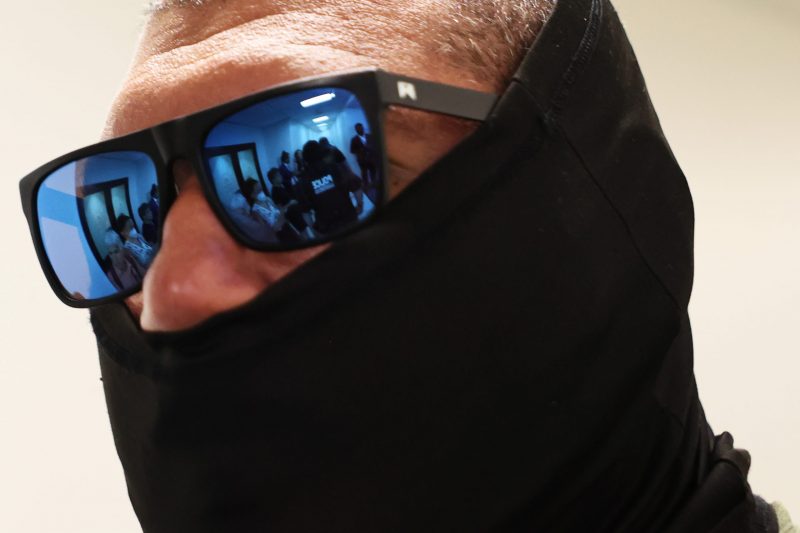 Federal judge stops New York from prohibiting face coverings and mandates visible badges for ICE officers.