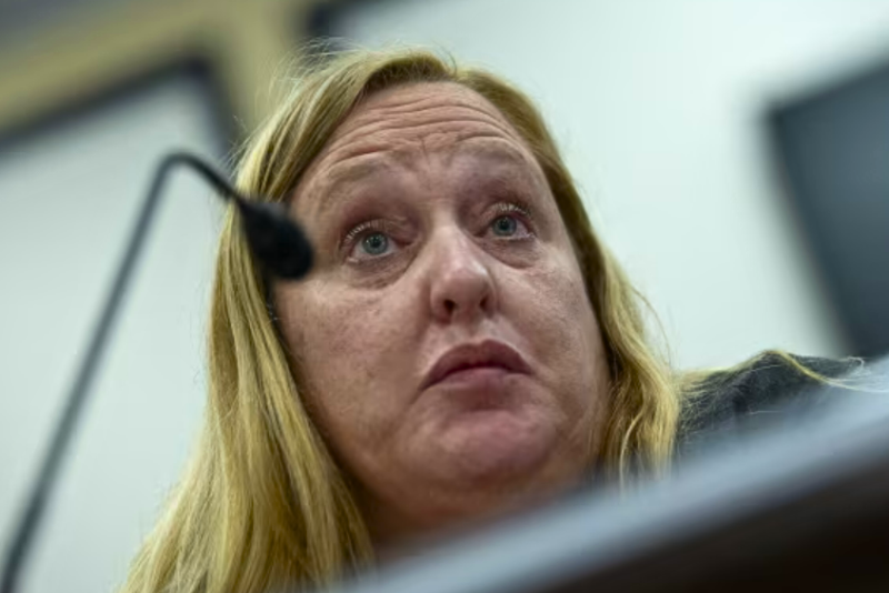 Former official indicted for allegedly directing donor money to a Neo-Nazi informant and romantic partner