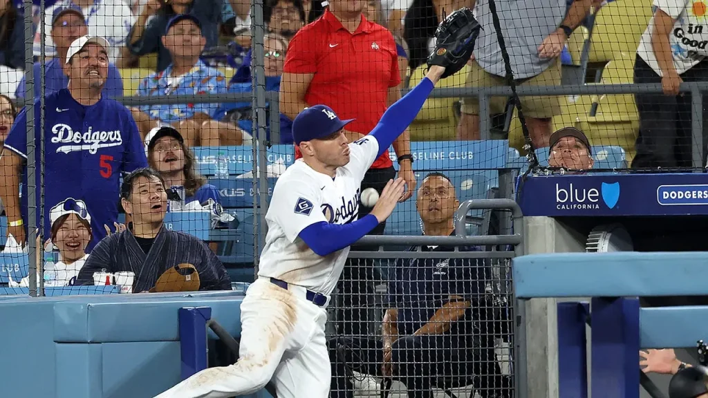 Freddie Freeman of the Dodgers has a frightening fall down the dugout stairs