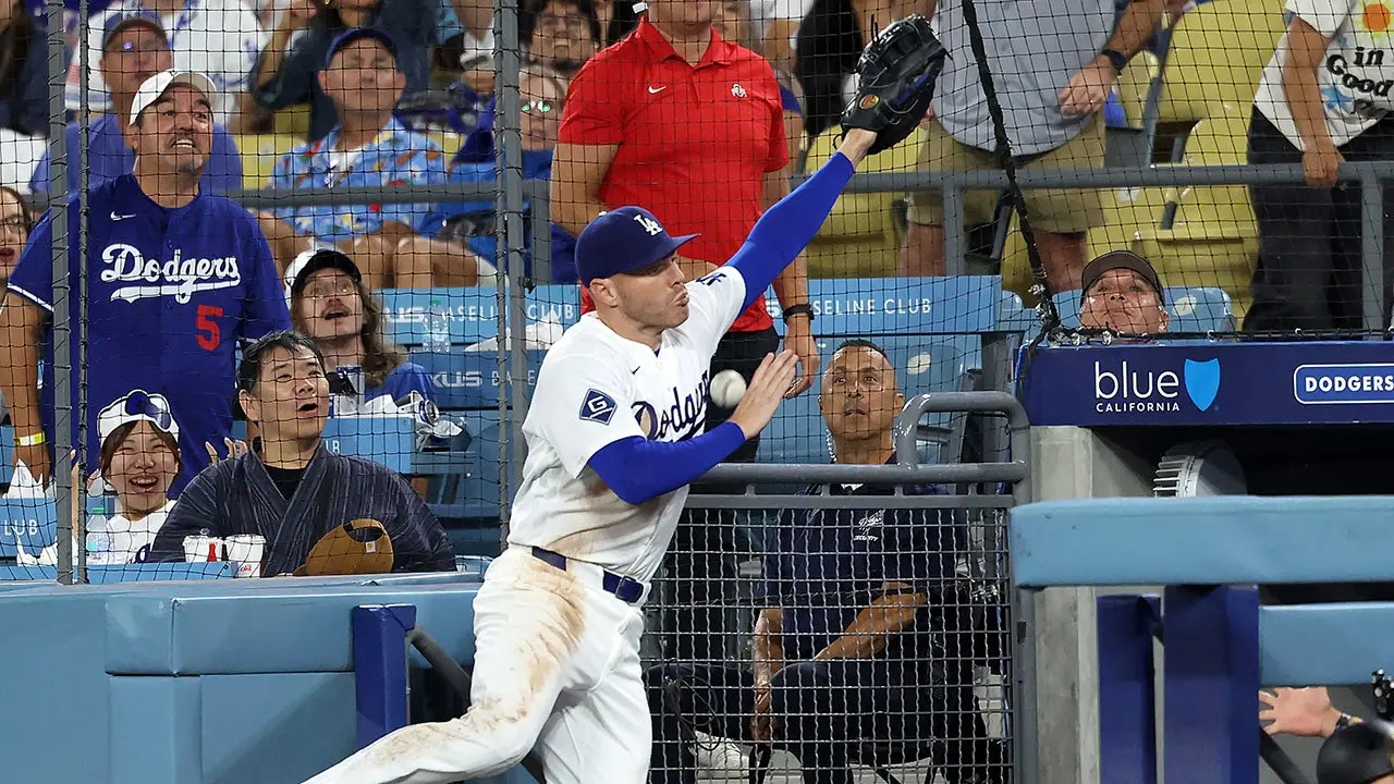 Freddie Freeman of the Dodgers has a frightening fall down the dugout stairs