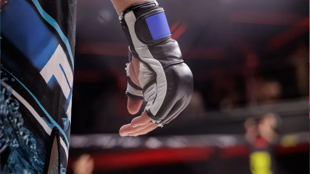 MMA fighter showcases impressive dance entrance, but gets quickly defeated as the match starts.