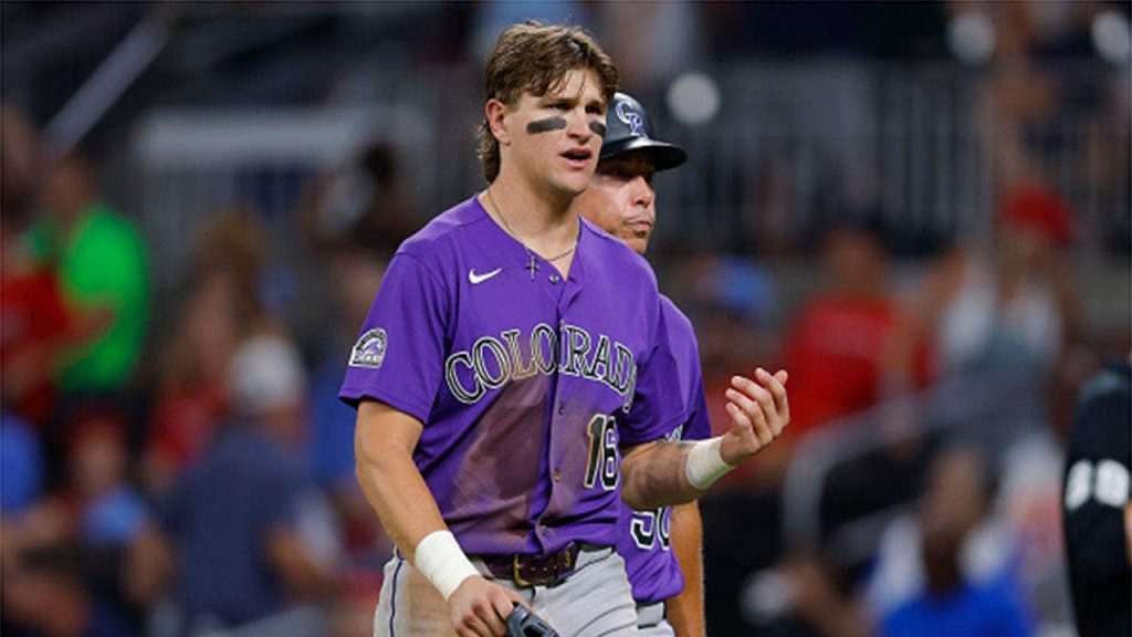 Rockies player sidelined after gesturing at Braves fans, seen on video making an offensive gesture.