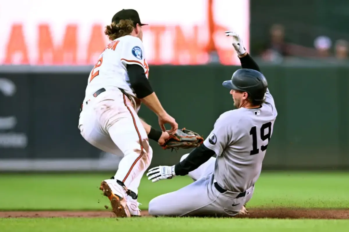 Ryan McMahon leaves the game with a left-hand injury in Yankees' victory
