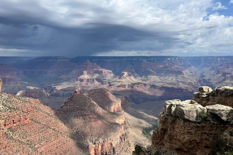 Two people have died in flash flooding at the Grand Canyon, and search and rescue operations are ongoing.