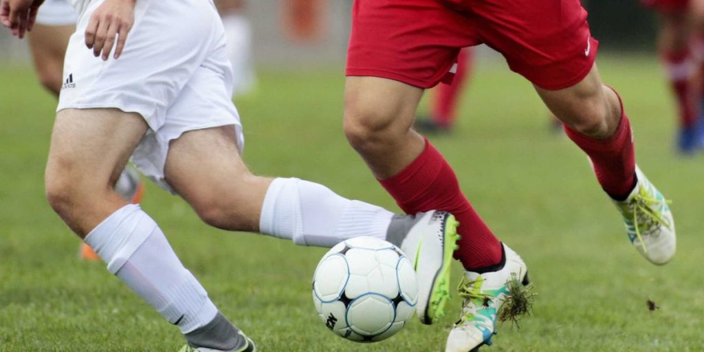 Viral footage captures high school soccer player attacking an opponent before disorder breaks out &mdash; and authorities are looking into it.