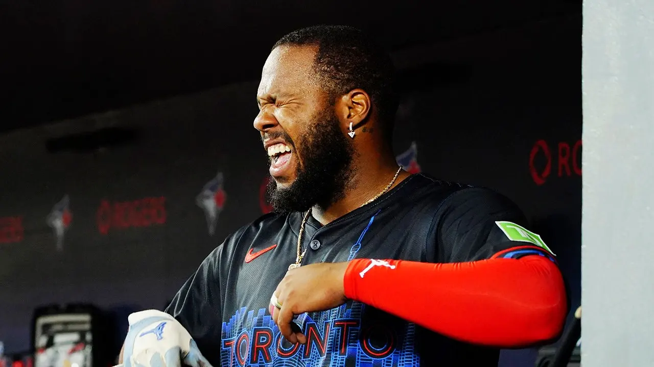 Vladimir Guerrero Jr. of the Blue Jays struck in the head during a wild play, taken out of the game