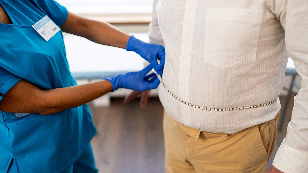 Waist size might be a better indicator of heart disease risk than BMI, according to research.
