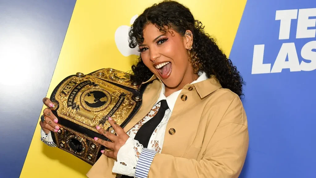 Willow Nightingale, the AEW women's champion, suffers a hand injury before the All In match but promises to defend her title.