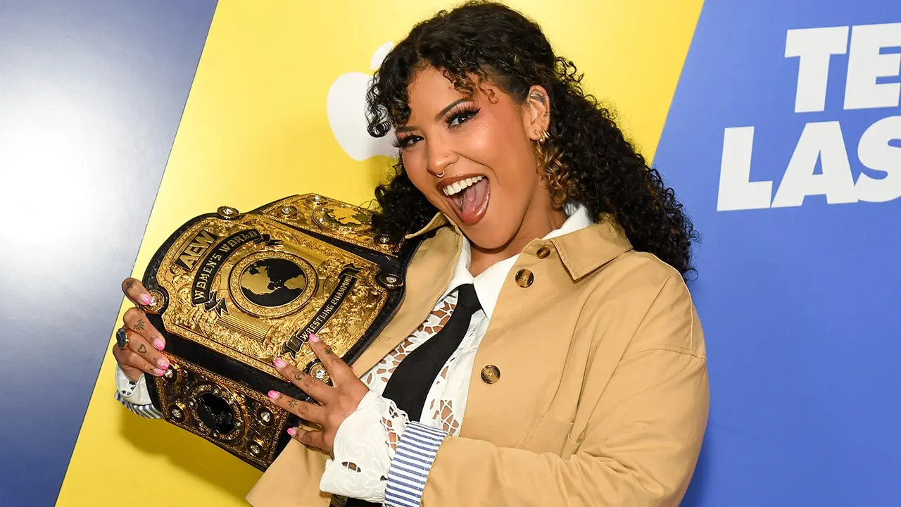 Willow Nightingale, the AEW women's champion, suffers a hand injury before the All In match but promises to defend her title.