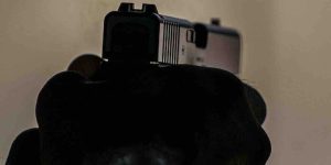 A garbage truck driver with a concealed carry permit shot at two robbers last year, resulting in one death. The survivor has now discovered his outcome.