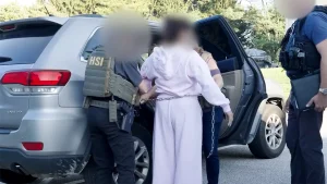 Authorities arrest undocumented immigrants charged with voting in competitive states during a crackdown on fraud.