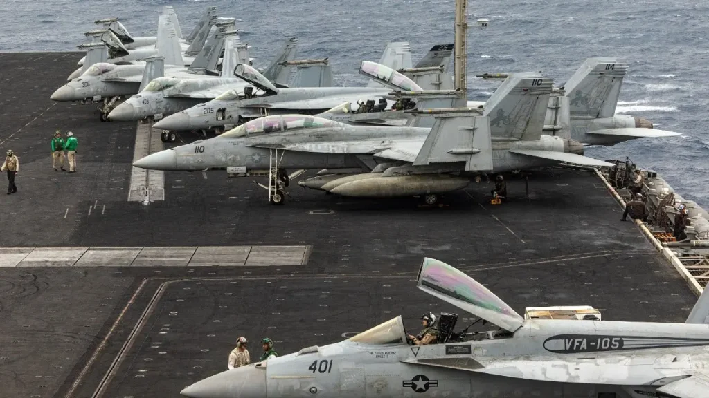 Aviators from the USS Dwight D. Eisenhower eject during landing, four sailors injured.