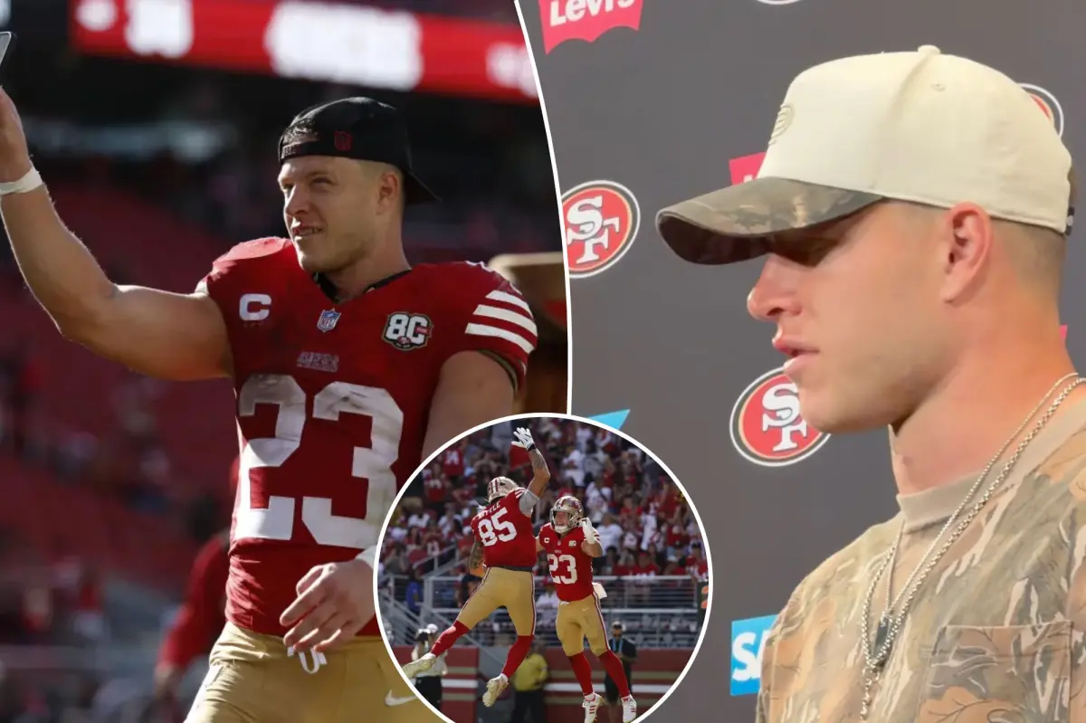 Christian McCaffrey shows a swollen lip after getting hit in the face against the Cardinals