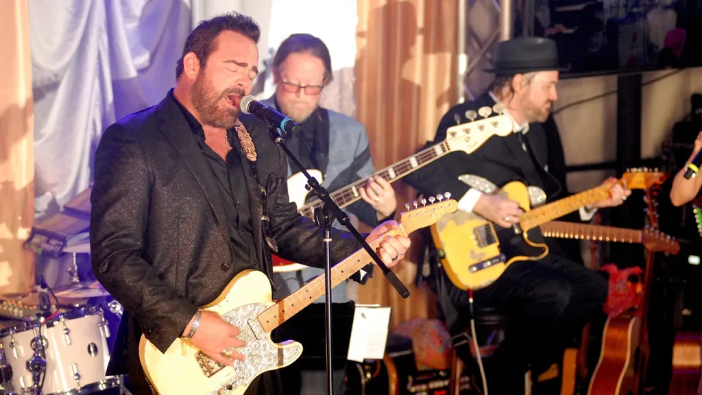 Country singer and ex-college football player Lee Brice criticizes NIL and professional athletes returning to college.