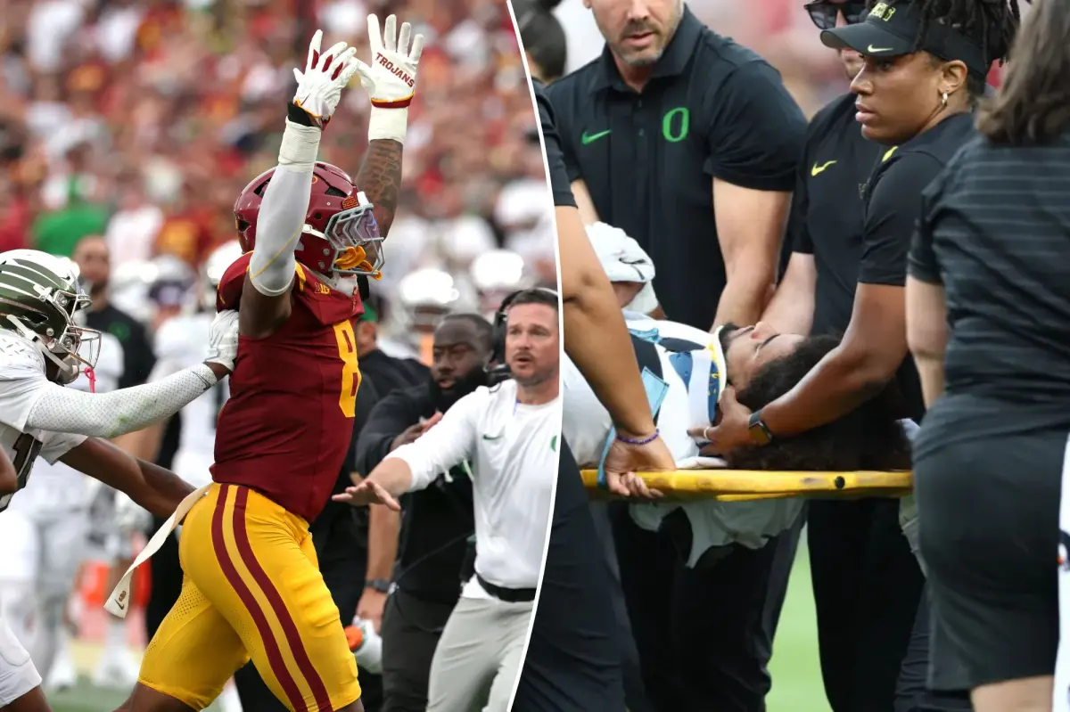 Desman Stephens from USC celebrates after a hit sends Oregon QB Dante Moore to the hospital.