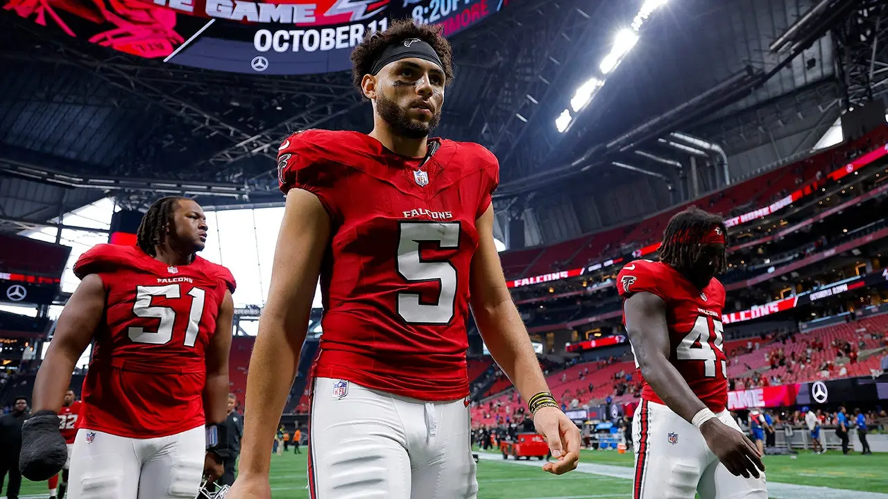 Drake London of the Falcons yells at a fan during the team's heavy defeat to the Panthers