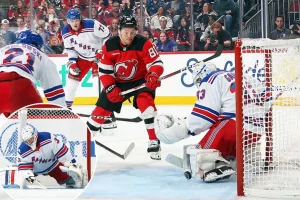 Dylan Garand argues for his position as the Rangers' backup goalie