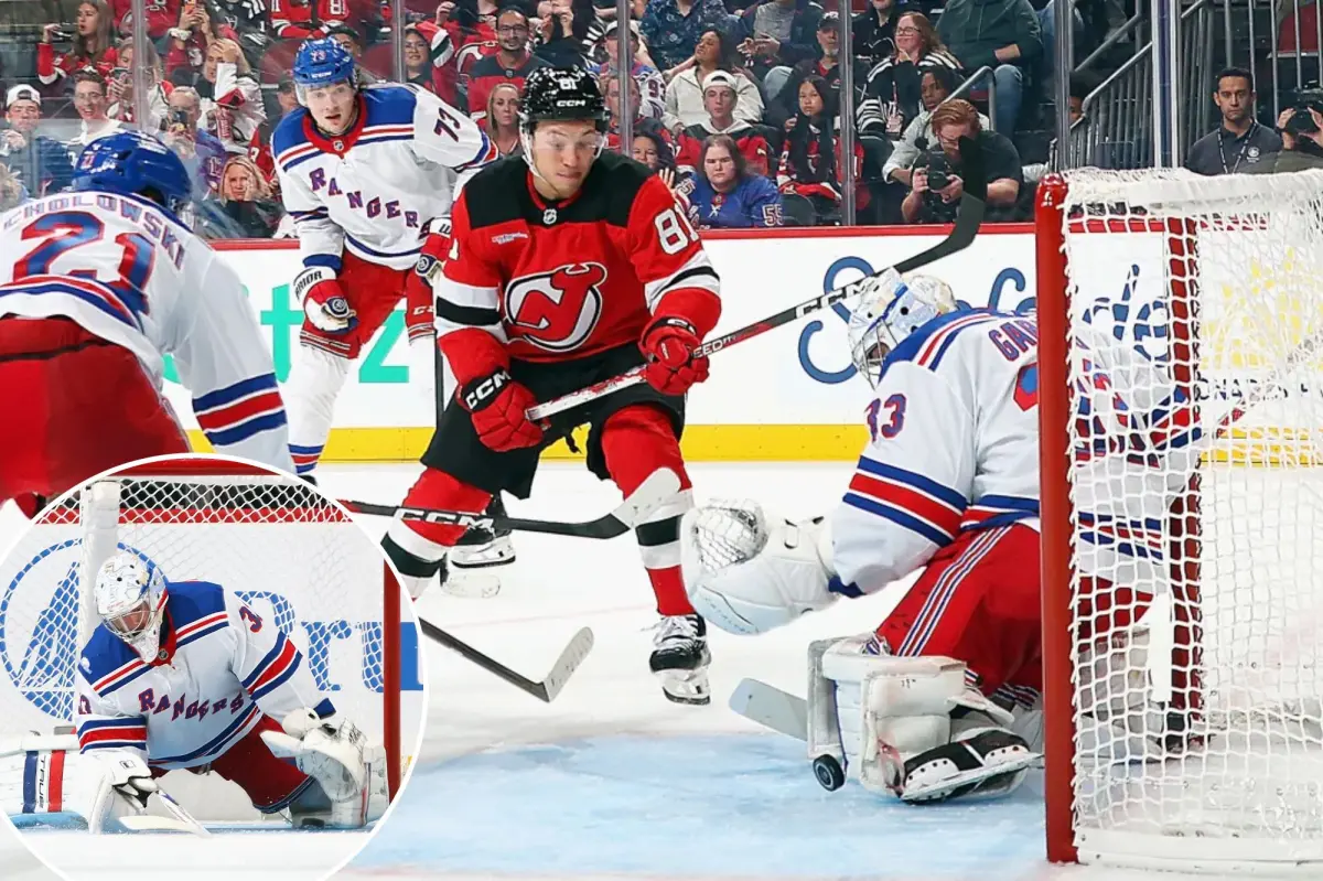 Dylan Garand argues for his position as the Rangers' backup goalie