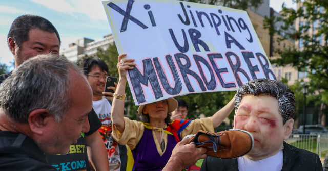 Hundreds Demonstrate Against Chinese Communism Near White House During State Dinner for Xi