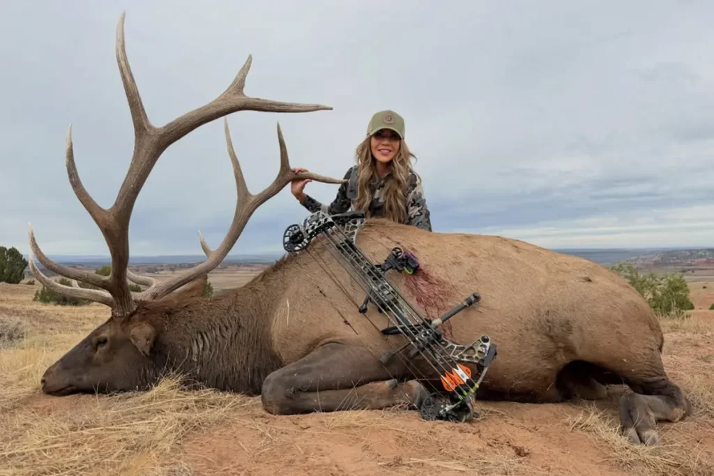 Kristi Noem shares striking bow-hunting images with a large dead elk