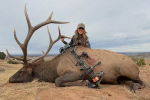 Kristi Noem shares striking bow-hunting images with a large dead elk