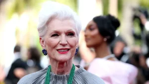 Maye Musk supports Sydney Sweeney's nude sports advertisement and reflects on her 12-year journey to citizenship.