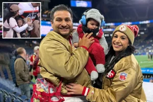 Mother in popular Giants game clip supports her husband amid criticism for handling responsibilities.