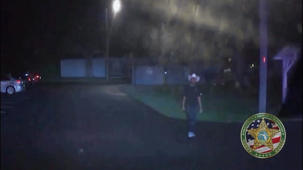 Police bodycam footage reveals a suspect armed with a sword being tased.
