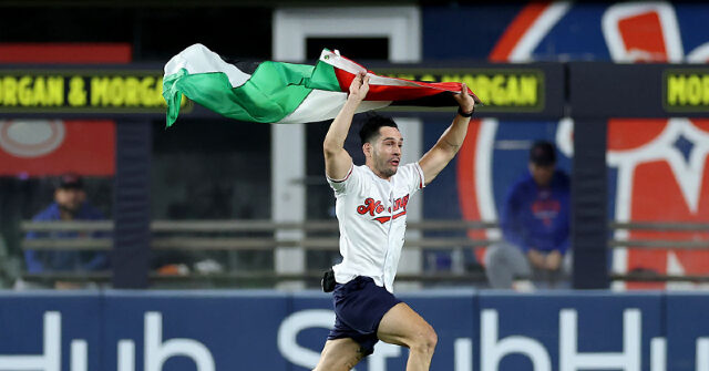 Protester Holding Palestinian Flag at Yankee Stadium Recognized
