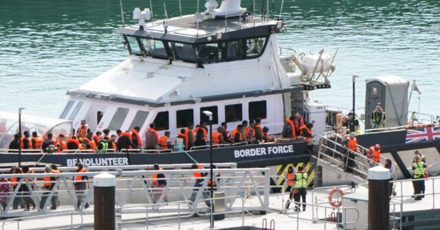 Protesters Dressed in Black Demonstrate in Dover Over Channel Migrant Issue