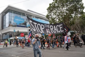 Protesters in San Francisco marched to call for regulations on AI technology, while executives remained unconcerned.