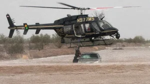 Sheriff's helicopter rescue in Arizona saves two individuals from a flooded vehicle