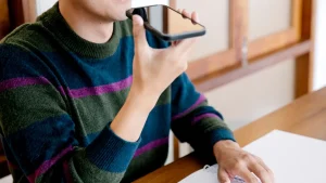 Siri bank scam employs a phony American Express number to take money from savings.