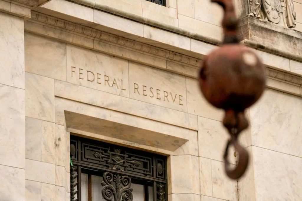 Stocks decline after the Fed increases rates and suggests another rise this year