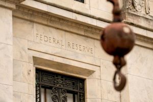 Stocks decline after the Fed increases rates and suggests another rise this year