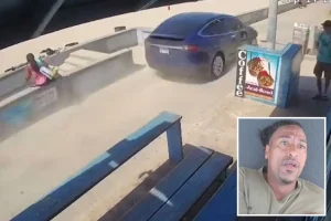 Stolen Tesla races along Pacific Beach boardwalk and hits a woman