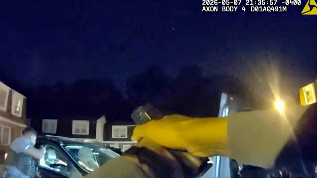 Suspect in Maryland carjacking injures officer, shot by police, body camera footage reveals