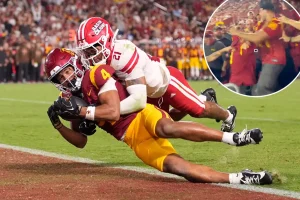 USC supporters throw punches in chaotic Coliseum brawl during Trojans' victory against Louisiana