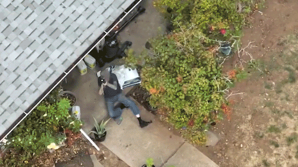 Video captures Oregon SWAT using a tractor to break through during standoff with shooting suspect