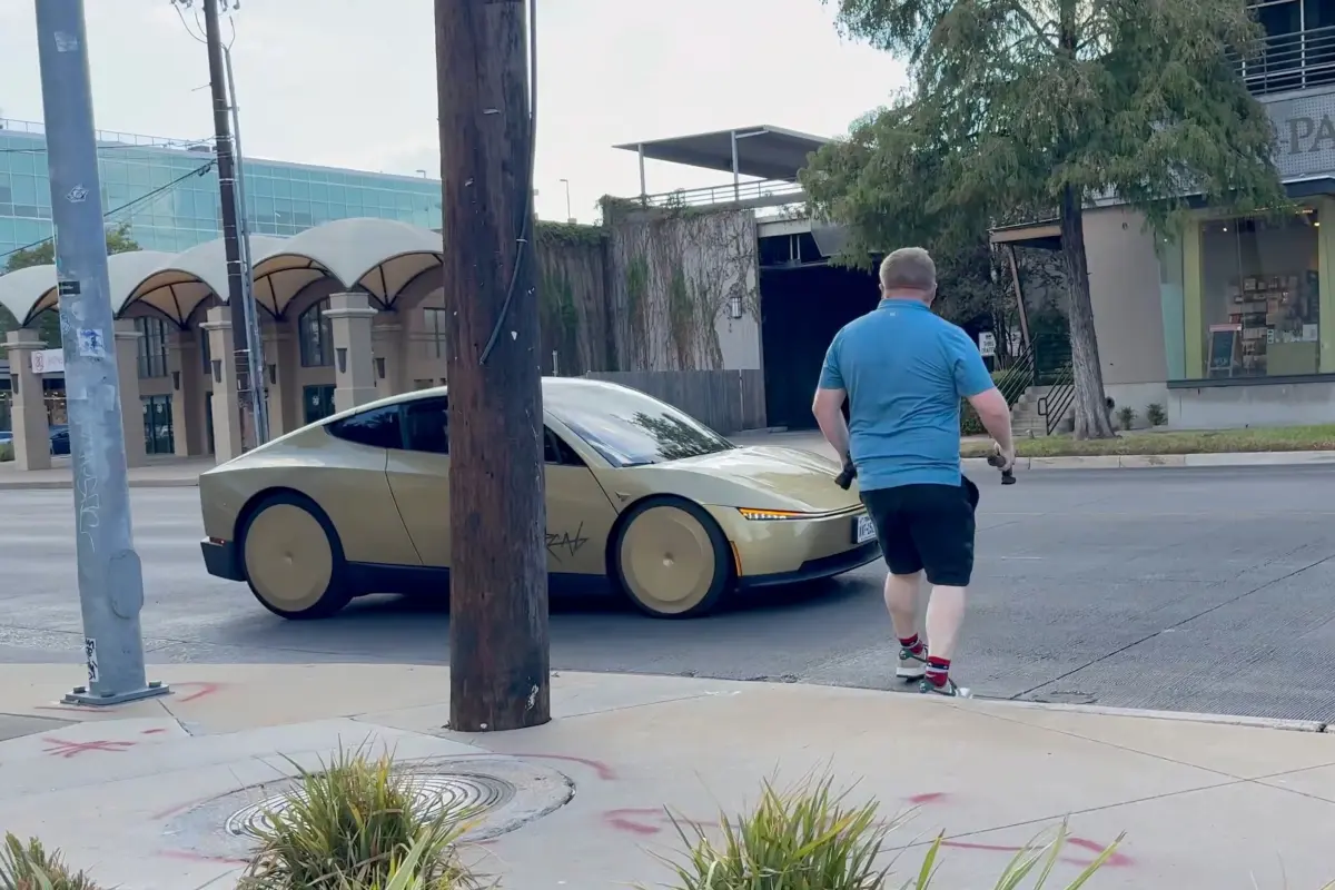 Viral video shows 'crazy' person jumping in front of Tesla Cybercab, causing it to stop and sparking safety concerns
