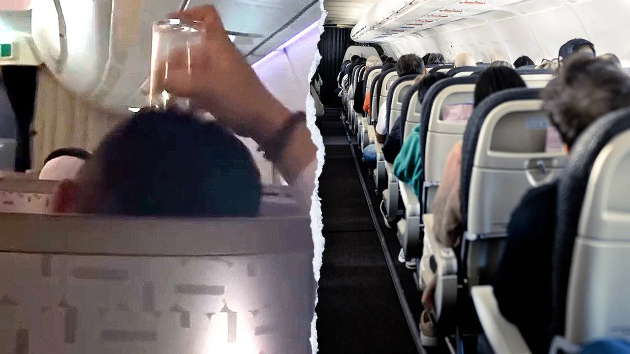 A passenger on an EVA Air flight uses a drinking glass to scratch his head during the flight.