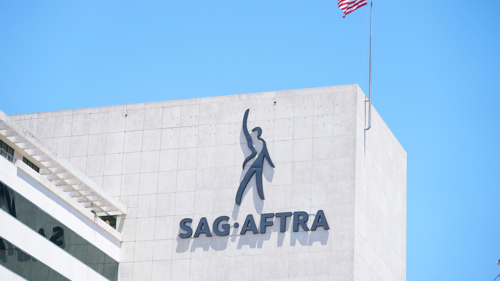 Actors from SAG-AFTRA advocate for increased Hollywood employment amid rising worries about health insurance access.