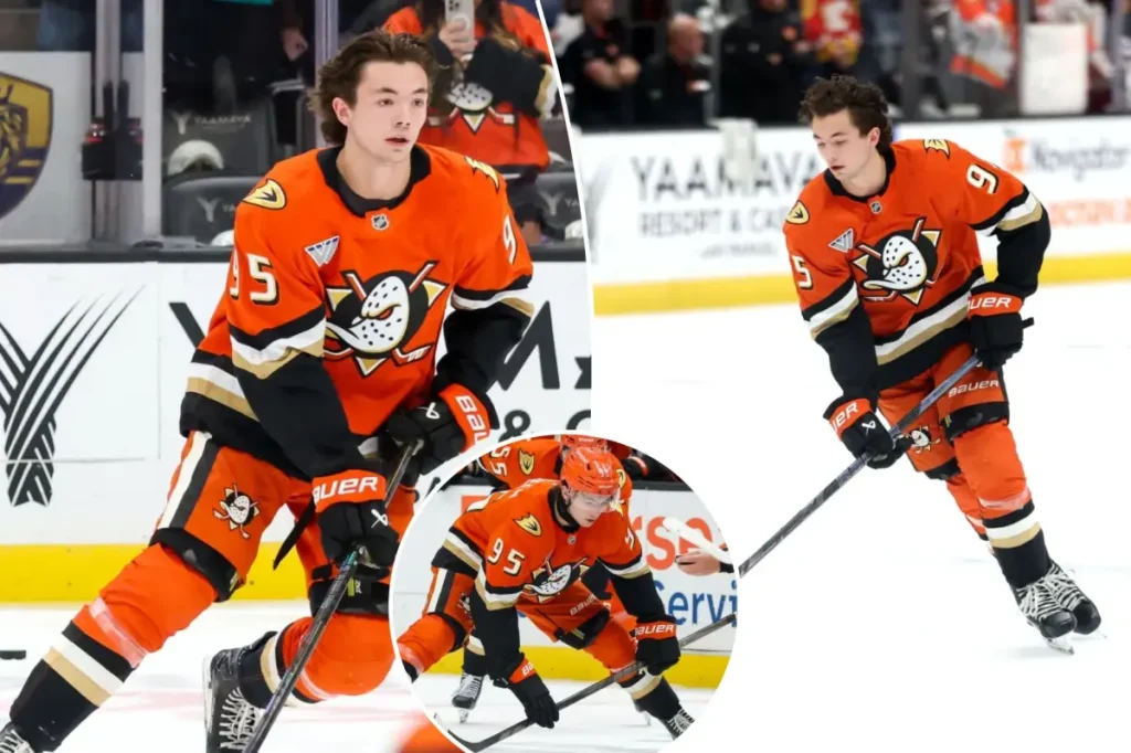 Anaheim Ducks' Roger McQueen celebrates his Disney ties during his first solo lap in the NHL.