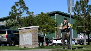 Armed bystander halts Oregon school shooting during gun control discussion