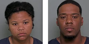 Assistant principal and her husband charged with assaulting two men during dispute at girls' softball game for 12-year-olds