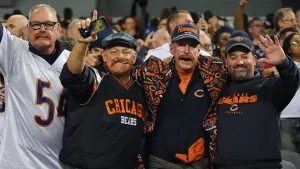 Bears fans sport Mike Ditka's iconic mustache as the franchise legend is remembered during the first home game after his passing