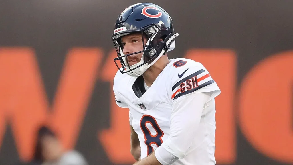 Bears kicker becomes a sensation after attempting to trip a Packers receiver who knocked down a Chicago coach on the sidelines