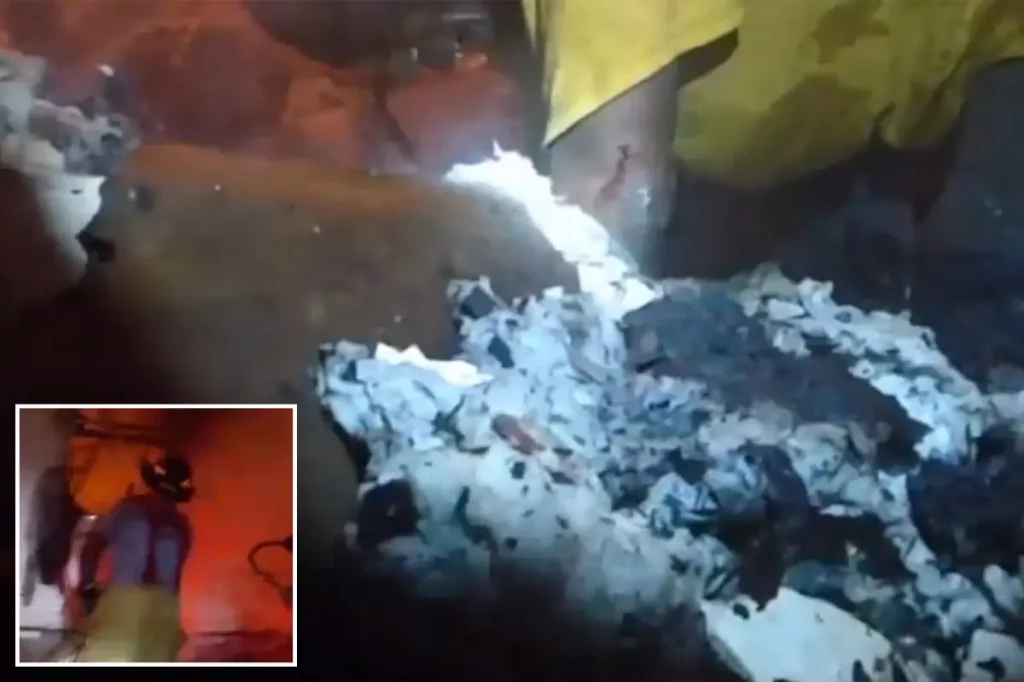 Brave neighbor in Mississippi searches through the burning debris by hand to save 4-year-old boy trapped in house fire